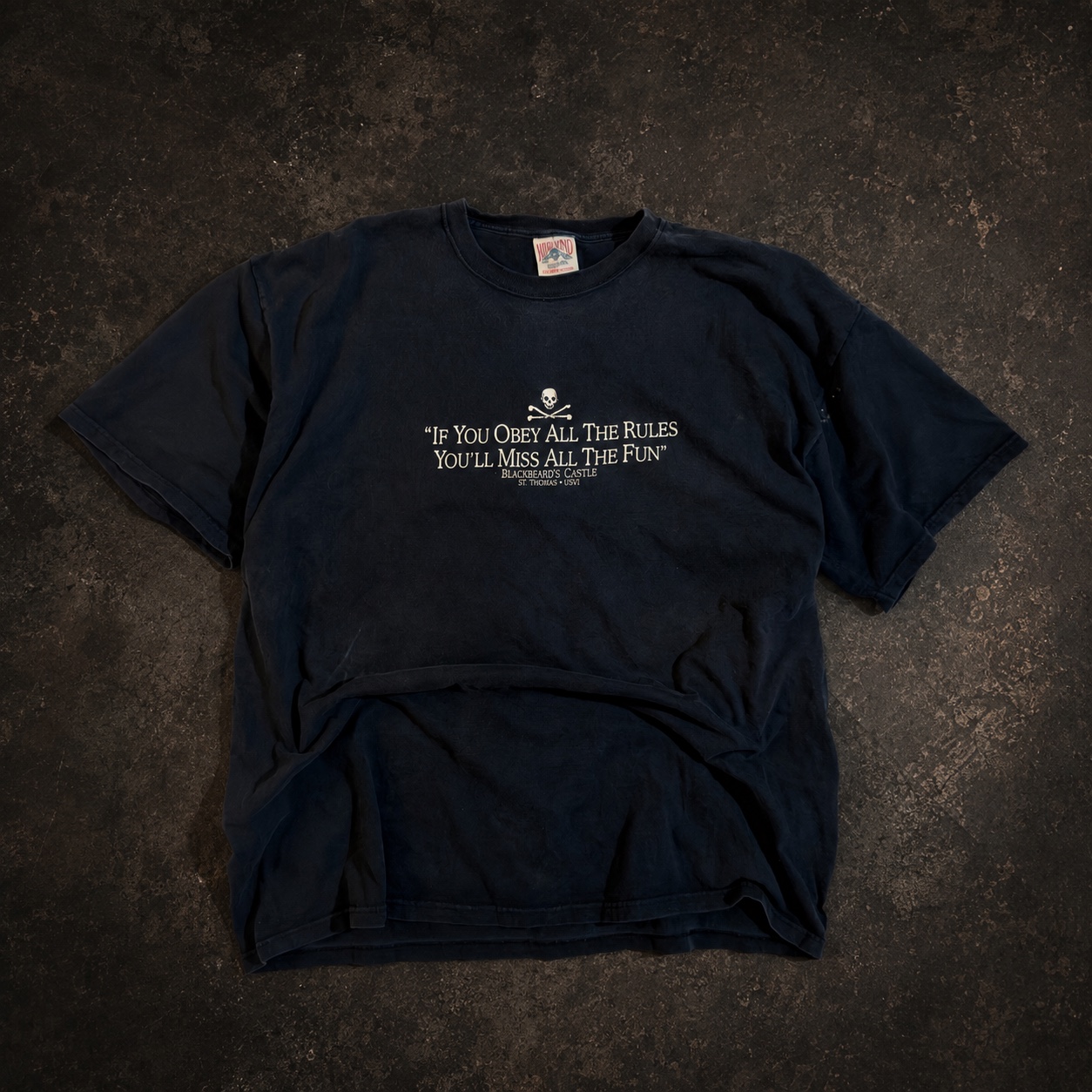 Exact Blackbeard's Castle vintage tee photographed on concrete